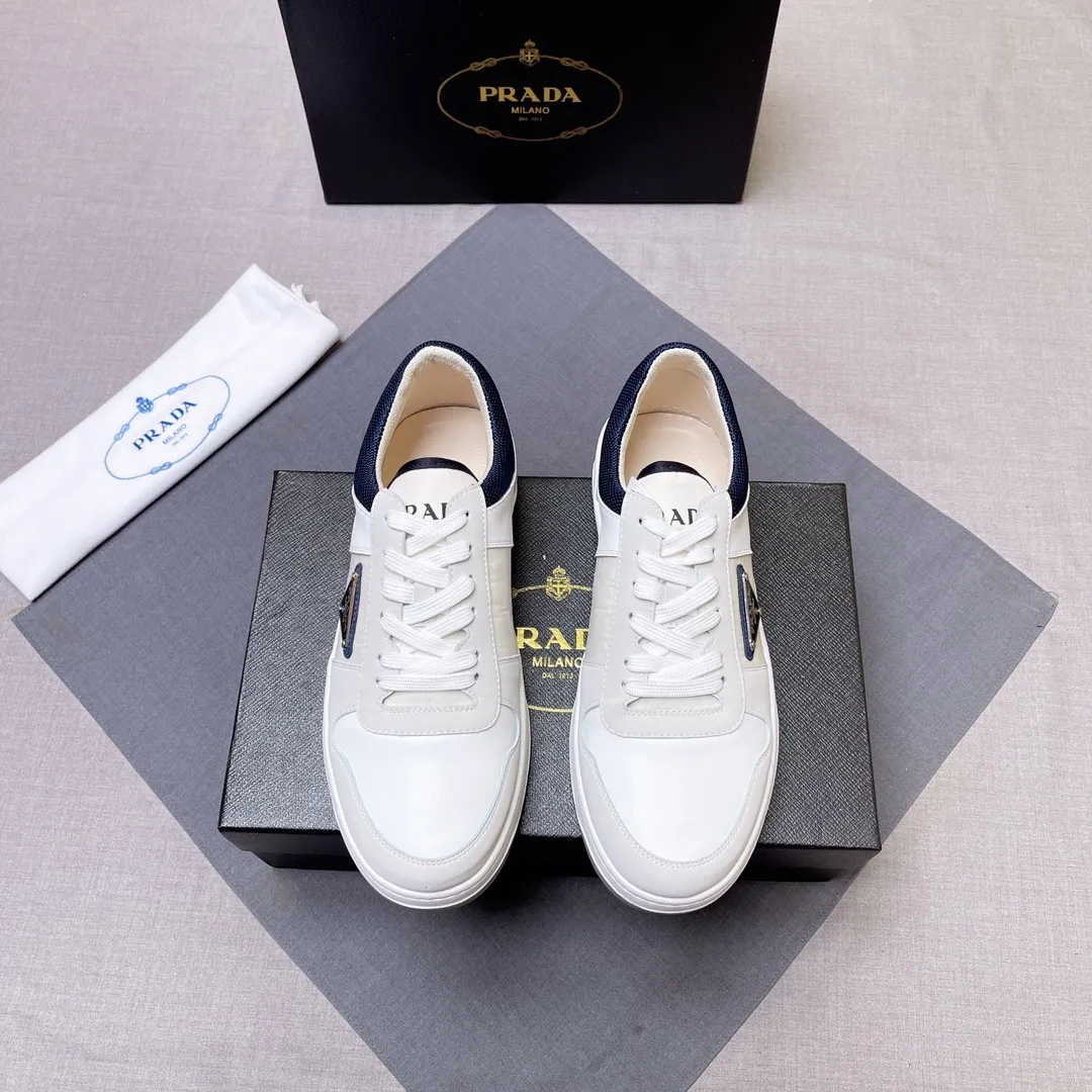P400 Prada Prada's new men's leather sneakers, the highest version on the market, any comparison is welcome🆚! The original leather has excellent texture and is super high-end! Fetal sheep net lining imported from Italy, removable pad! Luxurious materials and fine workmanship, highly recommended! Code number 38-45 No. 058